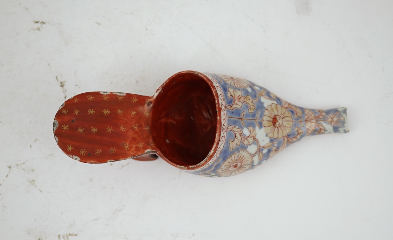 A rare Japanese Arita or Chinese porcelain model of a shoe, based on a Delft shape, first half of 18th century